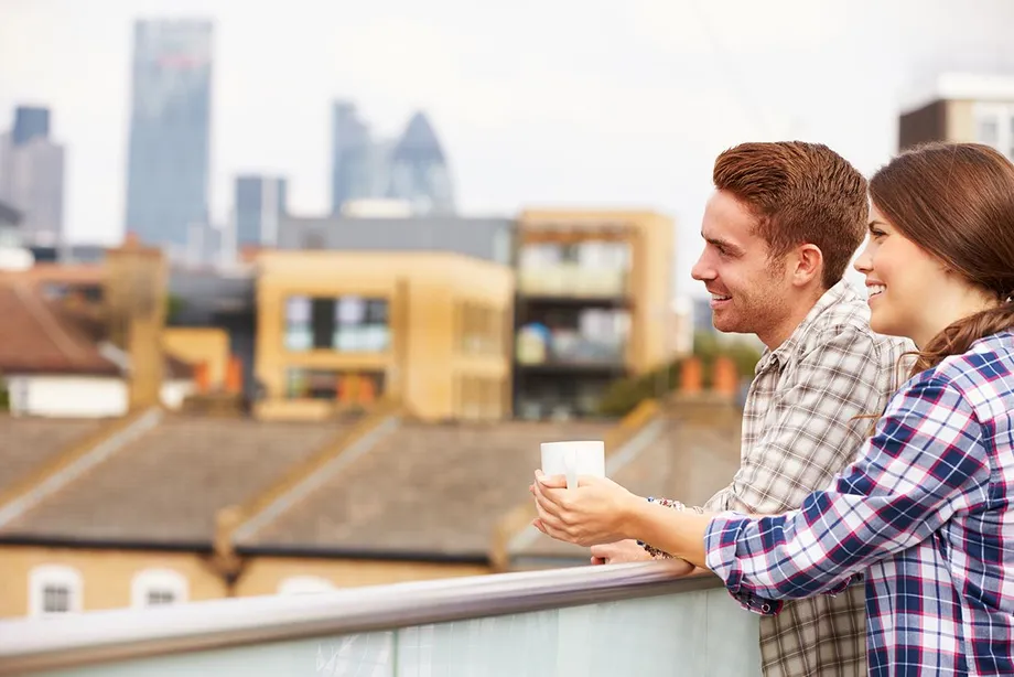 A man and a lady on the roof